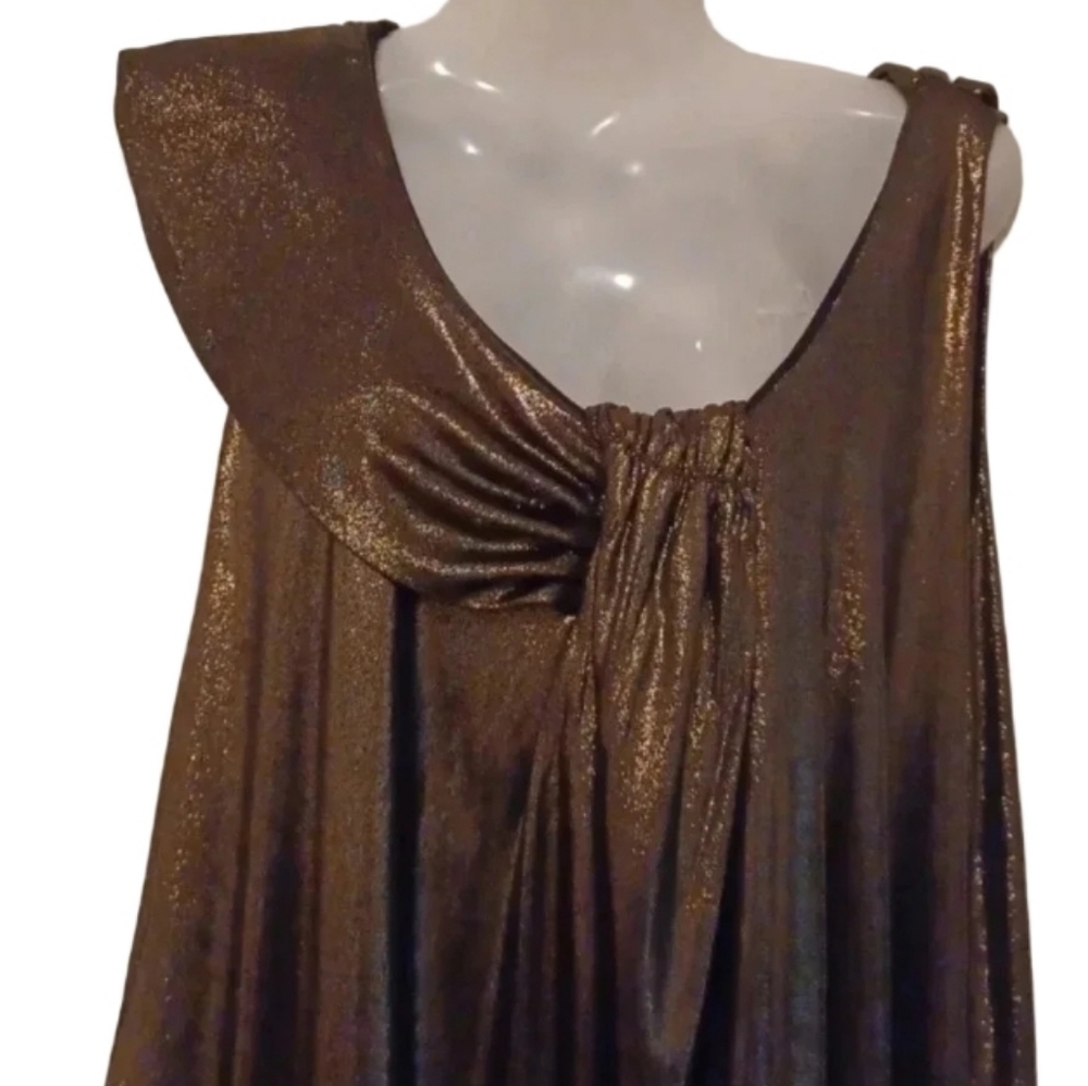 gold top with asymmetrical design